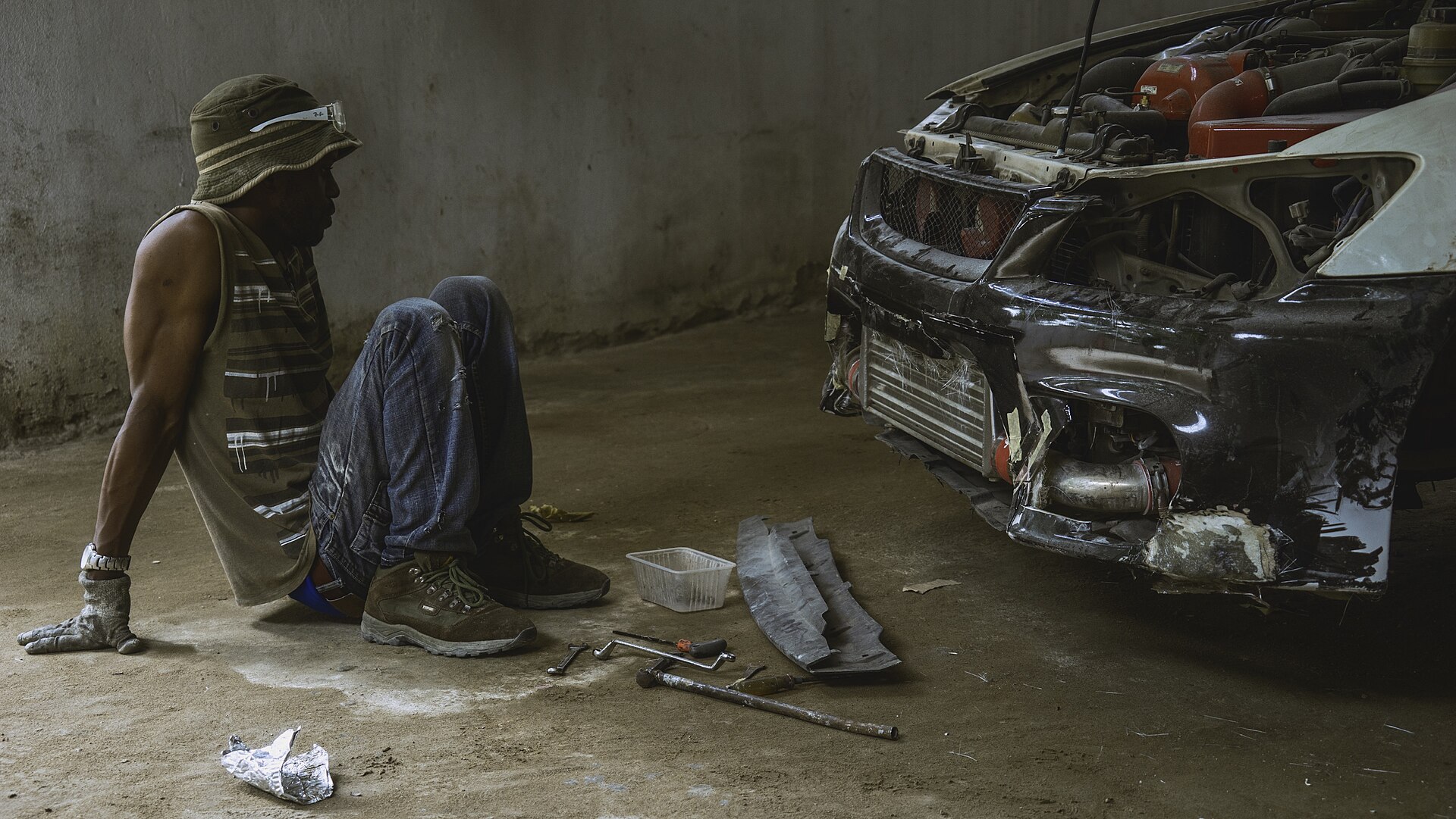 Locally trusted technician performing a vehicle inspection at Car Craft Automotive